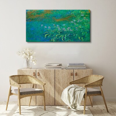 Foto op canvas Groen landschap met bloemen