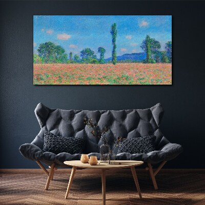 Foto op canvas Een bloemenveld onder een blauwe lucht