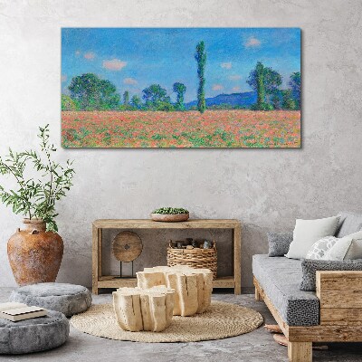 Foto op canvas Een bloemenveld onder een blauwe lucht