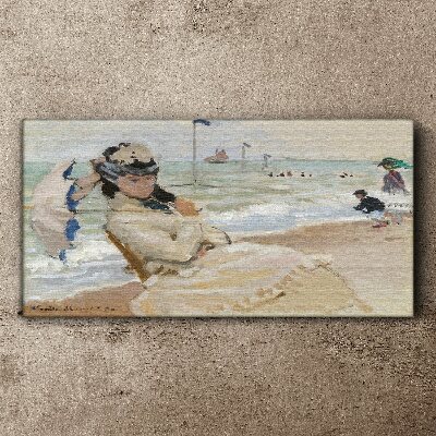 Foto op canvas Vrouw op het strand met een parasol