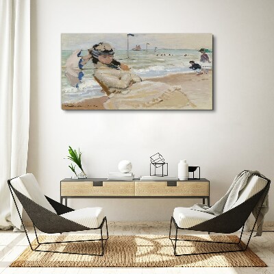 Foto op canvas Vrouw op het strand met een parasol