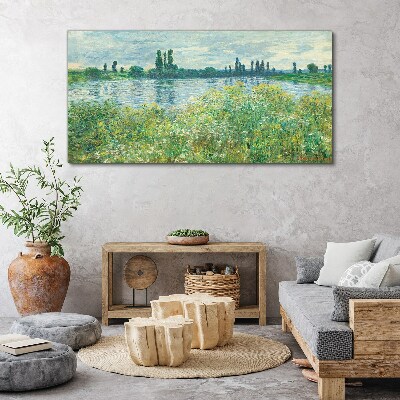 Canvas schilderij Uitzicht op de rivier in het groen
