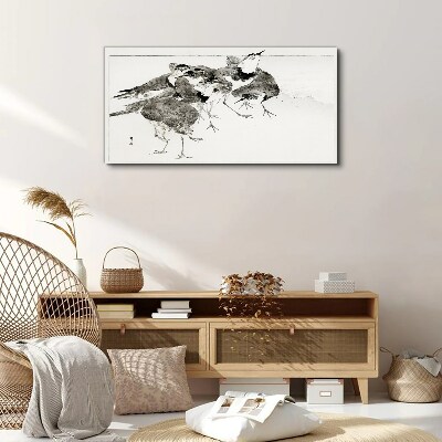 Schilderij op doek Een zwerm vogels tegen een witte achtergrond