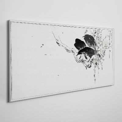 Schilderij op doek Zwarte vogels op een tak