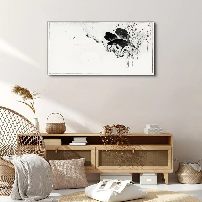 Schilderij op doek Zwarte vogels op een tak