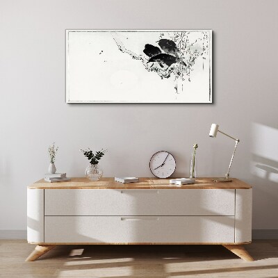 Schilderij op doek Zwarte vogels op een tak