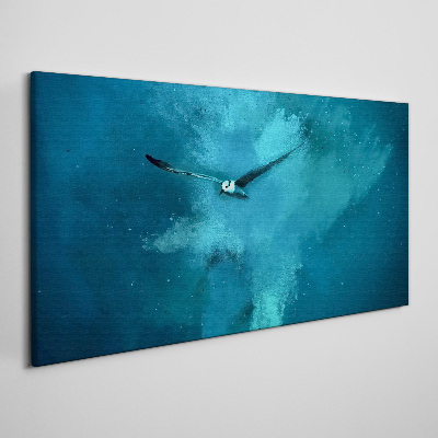 Foto op canvas Een vogel in de blauwe ruimte