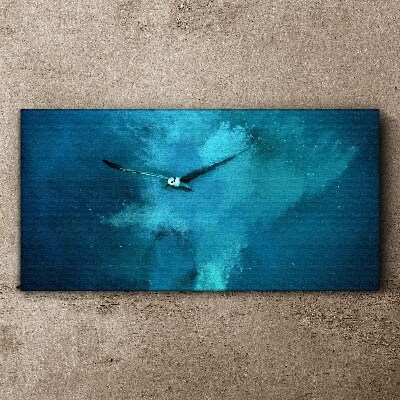 Foto op canvas Een vogel in de blauwe ruimte