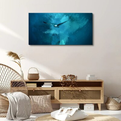 Foto op canvas Een vogel in de blauwe ruimte