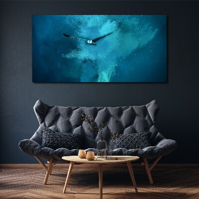 Foto op canvas Een vogel in de blauwe ruimte