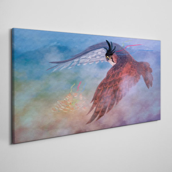 Schilderij op doek Vlucht van een roofvogel in de wolken