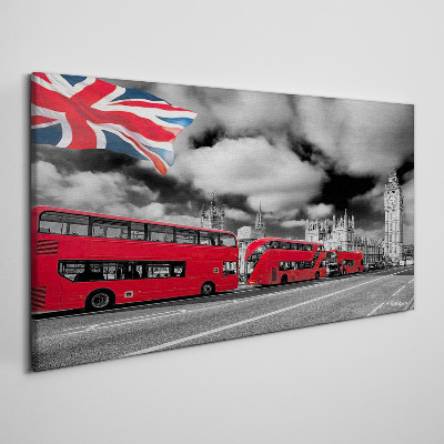 Canvas schilderij Rode Londense bussen met de Britse vlag