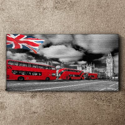 Canvas schilderij Rode Londense bussen met de Britse vlag