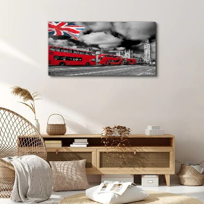 Canvas schilderij Rode Londense bussen met de Britse vlag