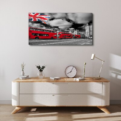 Canvas schilderij Rode Londense bussen met de Britse vlag