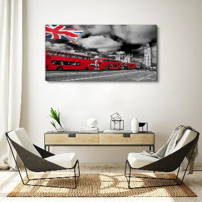 Canvas schilderij Rode Londense bussen met de Britse vlag