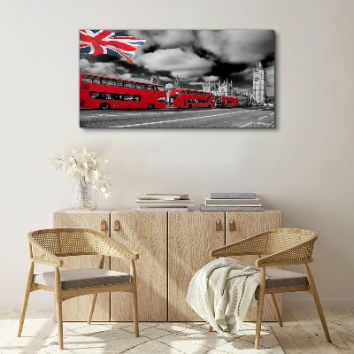 Canvas schilderij Rode Londense bussen met de Britse vlag