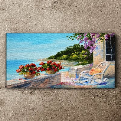 Schilderij op doek Bloemen en de zee in een zonnig landschap