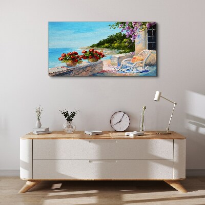 Schilderij op doek Bloemen en de zee in een zonnig landschap