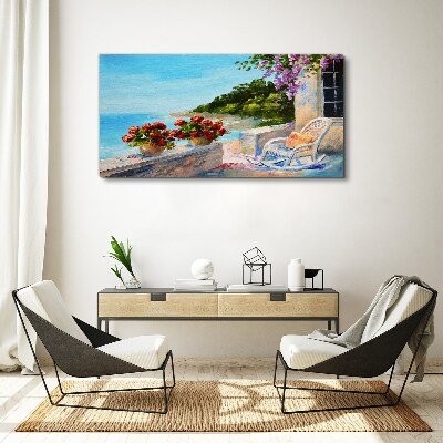 Schilderij op doek Bloemen en de zee in een zonnig landschap