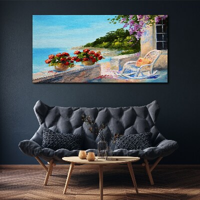 Schilderij op doek Bloemen en de zee in een zonnig landschap