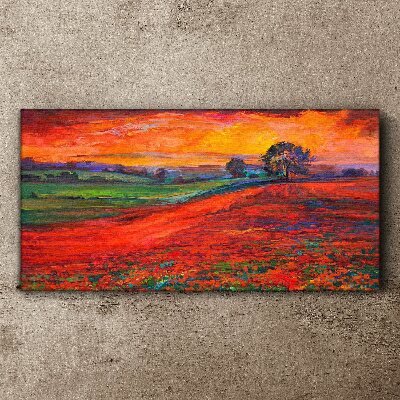 Canvas schilderij Zonsondergang boven een rood veld