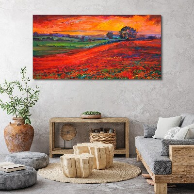 Canvas schilderij Zonsondergang boven een rood veld