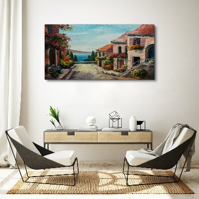 Schilderij op doek Een charmante straat aan zee
