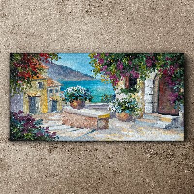 Foto op canvas Een kustplaats in bloemen