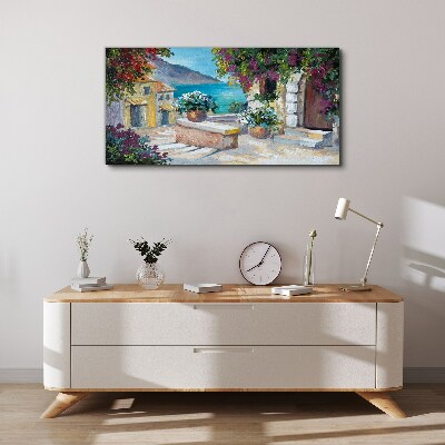 Foto op canvas Een kustplaats in bloemen