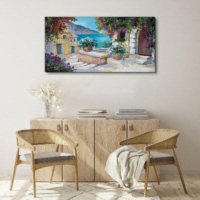 Foto op canvas Een kustplaats in bloemen