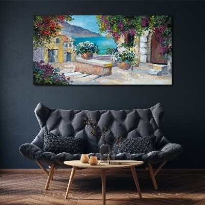 Foto op canvas Een kustplaats in bloemen