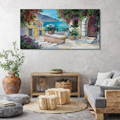 Foto op canvas Een kustplaats in bloemen