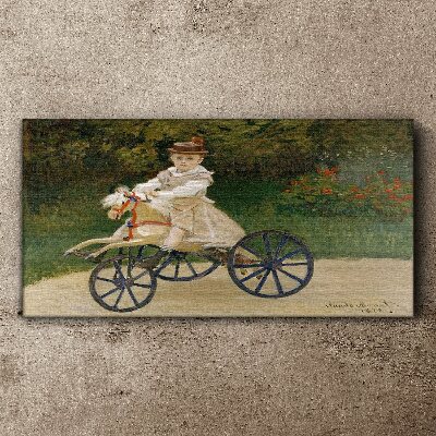 Schilderij op doek Kind op een loopfiets