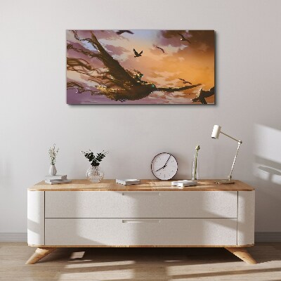 Canvas schilderij Vlucht van vogels in de ondergaande zon