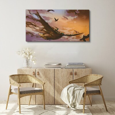 Canvas schilderij Vlucht van vogels in de ondergaande zon