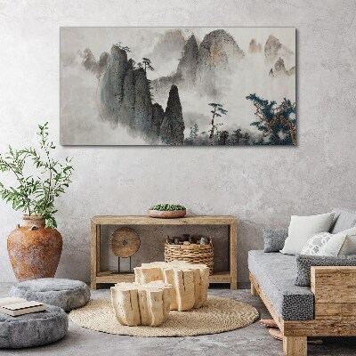 Foto op canvas Berglandschap in een mistig landschap