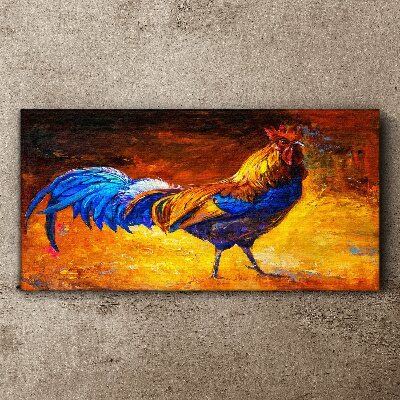 Canvas schilderij Een kleurrijke haan tegen de achtergrond van vuur