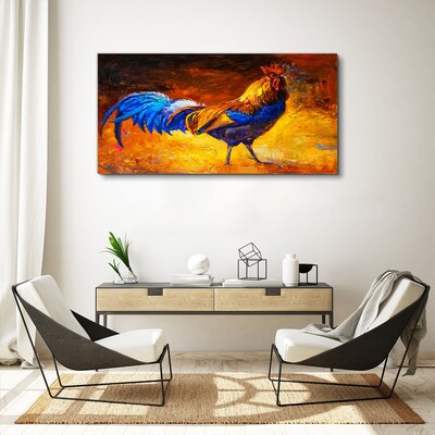 Canvas schilderij Een kleurrijke haan tegen de achtergrond van vuur