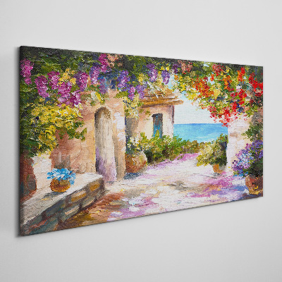 Foto op canvas De bloemenlaan van een kustdorp