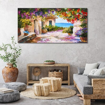 Foto op canvas De bloemenlaan van een kustdorp