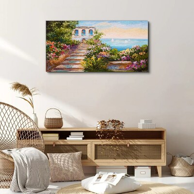 Schilderij op doek Een wandeling tussen de bloemen aan zee