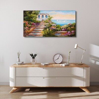 Schilderij op doek Een wandeling tussen de bloemen aan zee