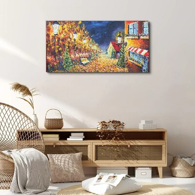 Foto op canvas Gouden laan in het schijnsel van lantaarns