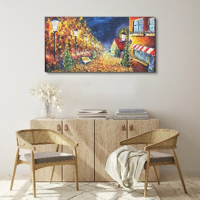 Foto op canvas Gouden laan in het schijnsel van lantaarns