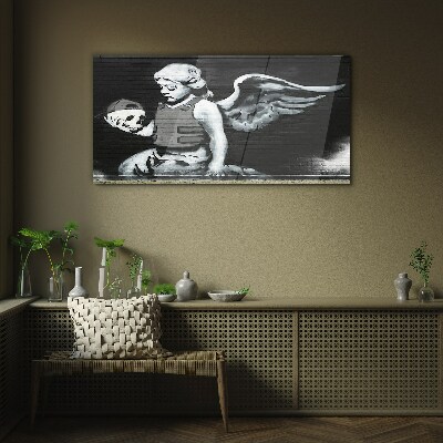 Glas foto Een engel met een schedel tegen een graffiti-achtergrond