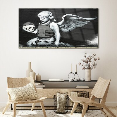 Glas foto Een engel met een schedel tegen een graffiti-achtergrond