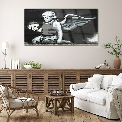 Glas foto Een engel met een schedel tegen een graffiti-achtergrond