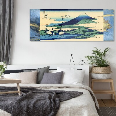 Schilderij op glas Kranen bij een berg