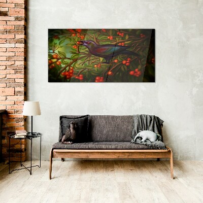 Foto op glas Een vogel tegen de achtergrond van een fruittak